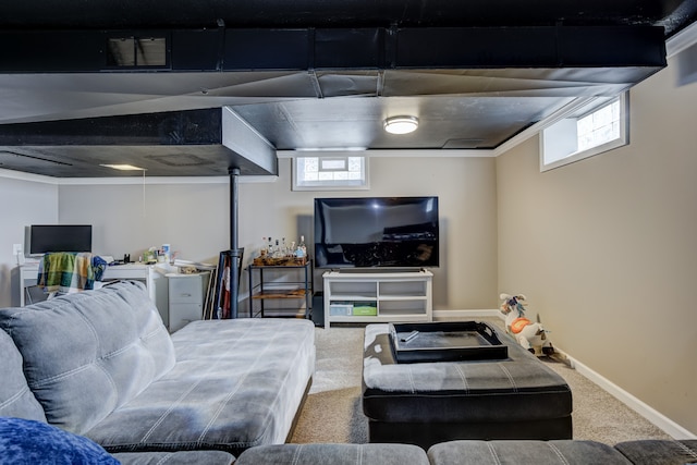 carpeted living room featuring a healthy amount of sunlight, visible vents, and baseboards