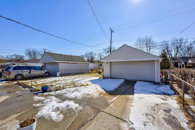 detached garage with fence