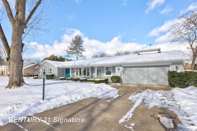 view of front of house featuring an attached garage, concrete driveway, and brick siding