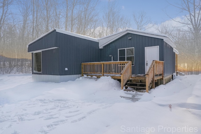 view of front of house with a wooden deck