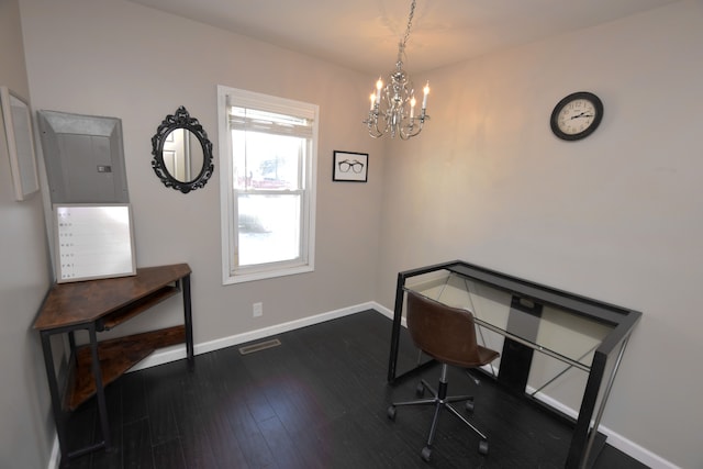 office area featuring dark wood-style floors, a notable chandelier, and baseboards