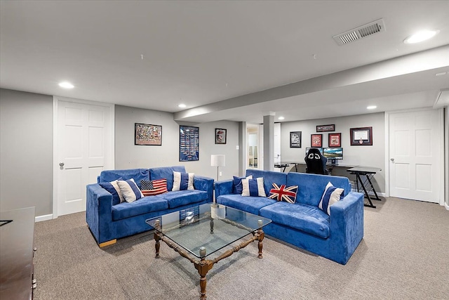 carpeted living area featuring baseboards, visible vents, and recessed lighting