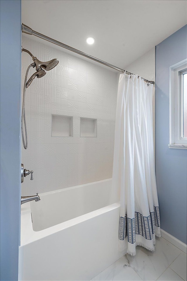 full bathroom with recessed lighting, marble finish floor, shower / bathtub combination with curtain, and baseboards