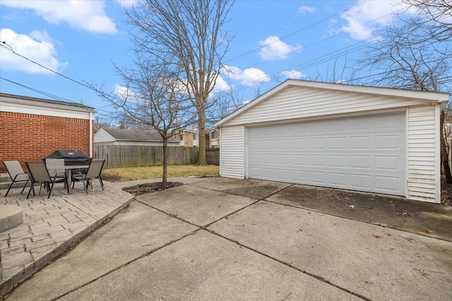 detached garage with fence