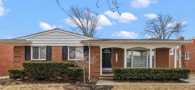 view of front of property featuring brick siding