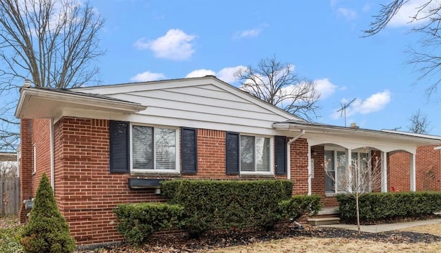 view of front of home with brick siding