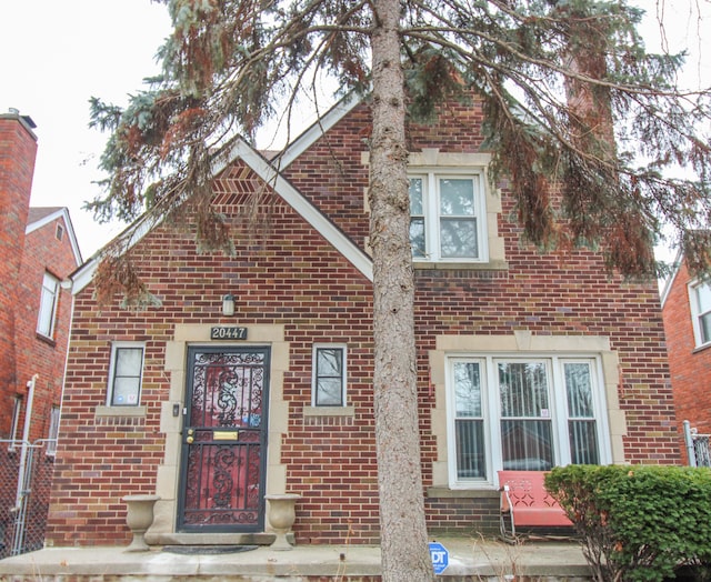 view of front of home featuring brick siding