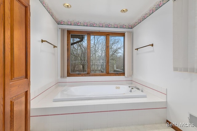 full bathroom featuring a bath