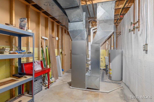 utility room with water heater