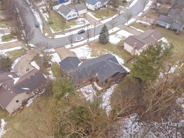 birds eye view of property with a residential view