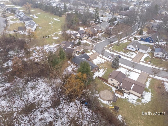 birds eye view of property with a residential view