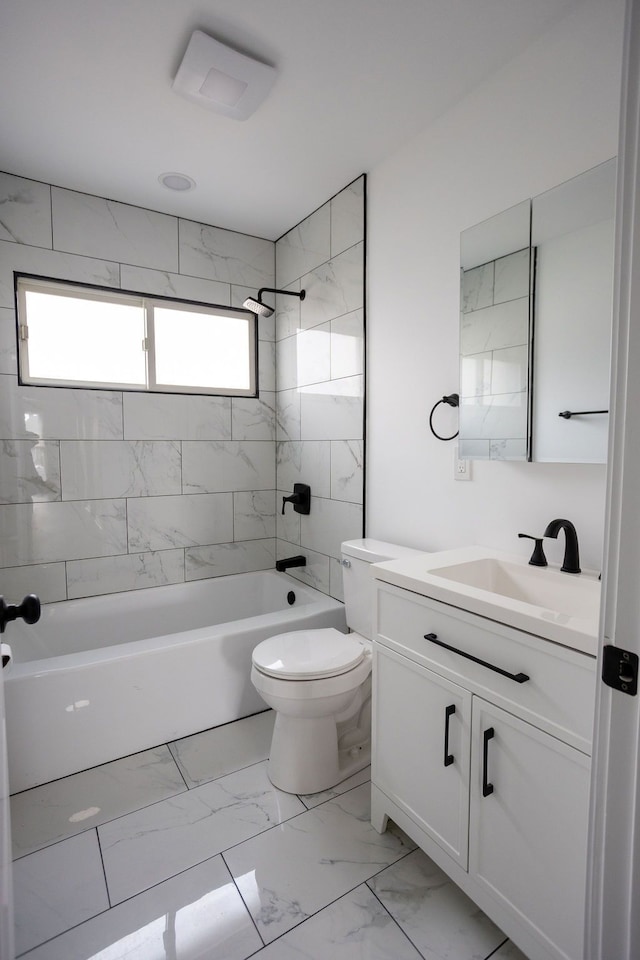 full bath with toilet, marble finish floor, vanity, and shower / bathtub combination