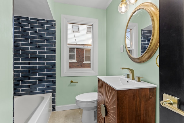 full bath with tile patterned flooring, vanity, toilet, and baseboards