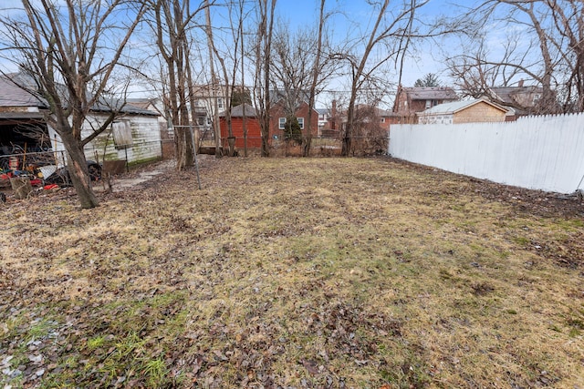 view of yard featuring fence