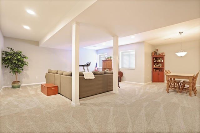 living room with carpet, baseboards, and recessed lighting