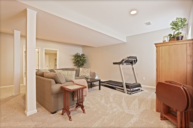 interior space featuring carpet flooring, visible vents, and baseboards