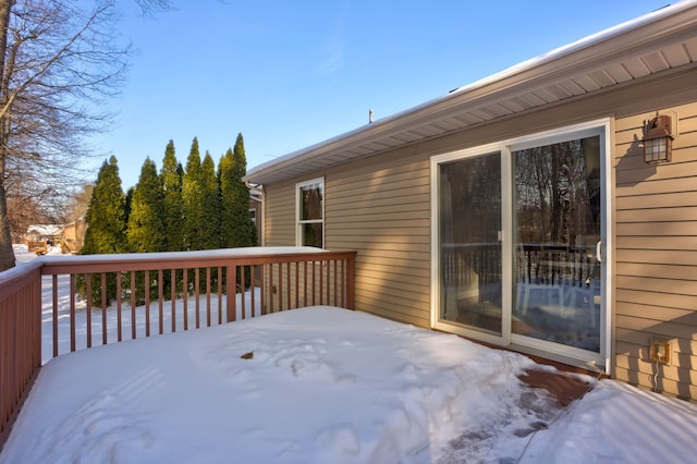 view of snow covered deck