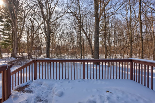 view of snow covered deck