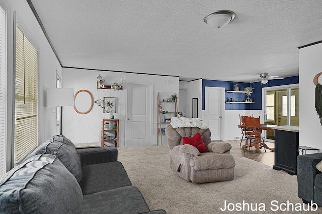 living area with a textured ceiling