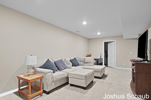 living room with carpet floors, visible vents, baseboards, and recessed lighting