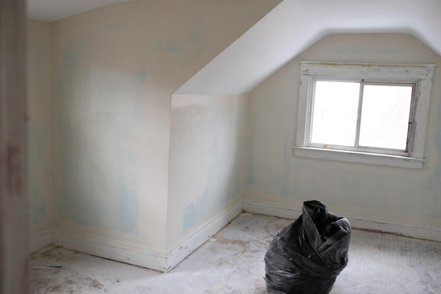 bonus room featuring vaulted ceiling