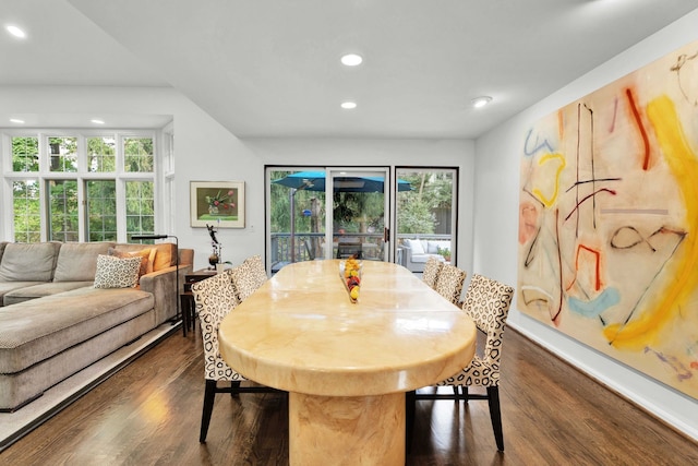 dining area with baseboards, dark wood-type flooring, and recessed lighting