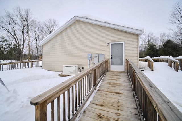 view of snow covered deck