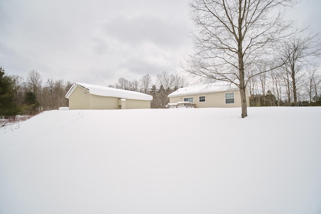 view of yard covered in snow