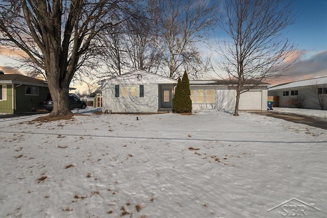 single story home with an attached garage