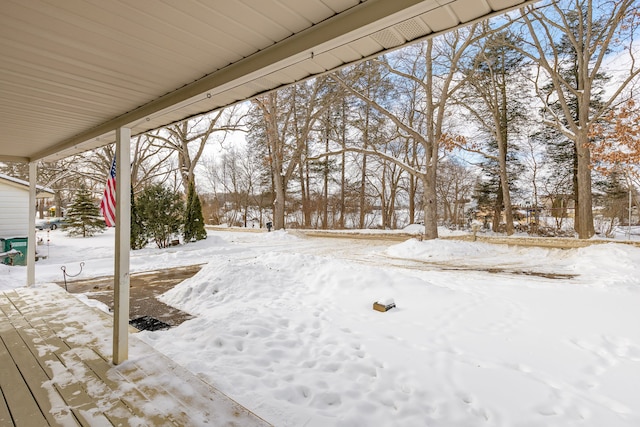 view of yard covered in snow