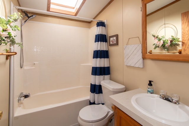 bathroom with toilet, a skylight, shower / bath combination with curtain, and vanity