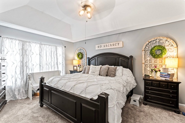 bedroom with vaulted ceiling, carpet, and a ceiling fan