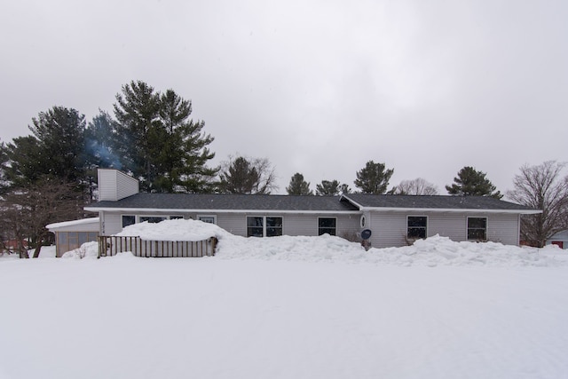 7214 S M 66, Mancelona, MI 49659 - view of front of home with a chimney
