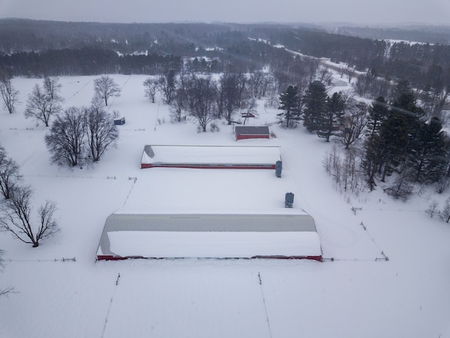 7214 S M 66, Mancelona, MI 49659 - snowy aerial view featuring a view of trees