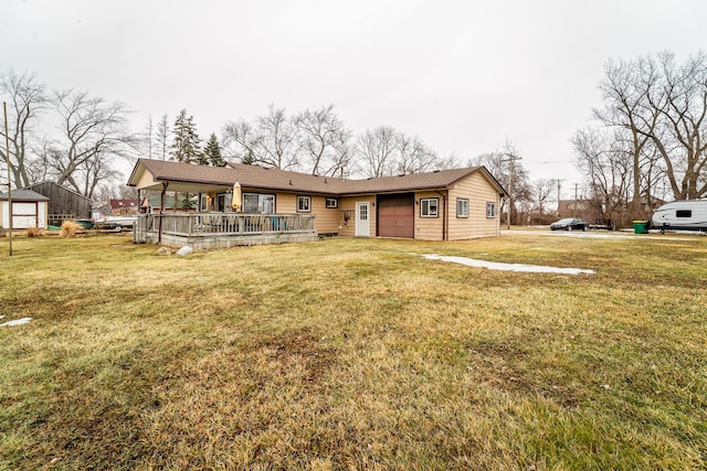 ranch-style home with a garage and a front lawn