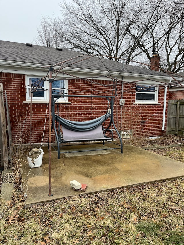 exterior space with a patio area and fence