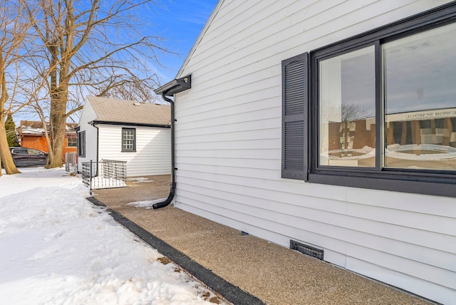 view of property exterior with crawl space