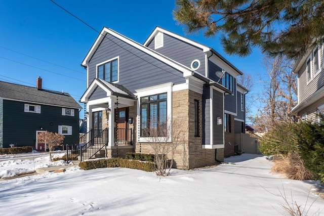 view of front of home with brick siding