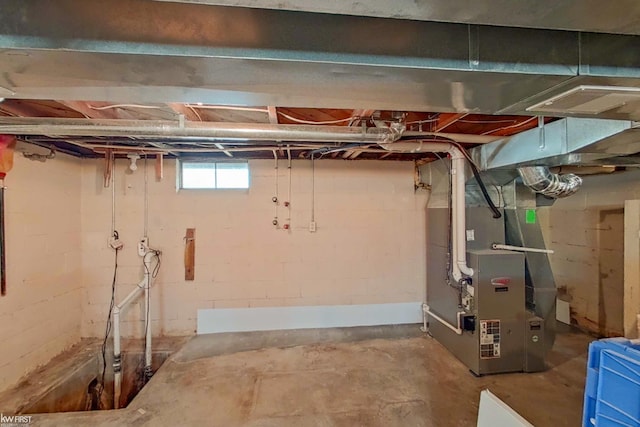 basement featuring heating unit