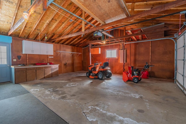 garage featuring a garage door opener