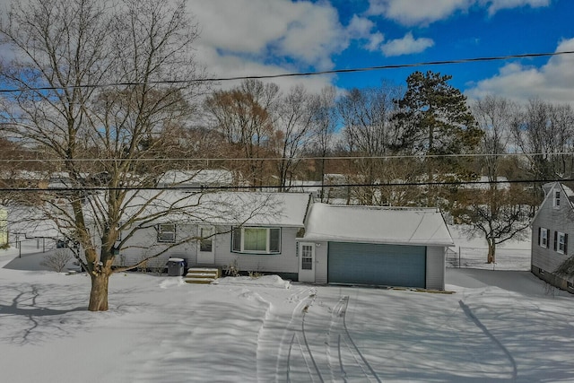 view of front of property with central AC unit