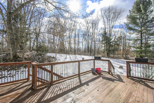 view of snow covered deck