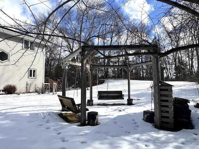 view of yard layered in snow