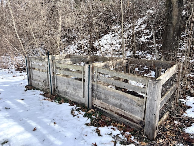 exterior details with a gate and fence