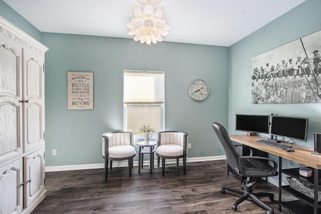 office area with dark wood-style floors, a notable chandelier, and baseboards