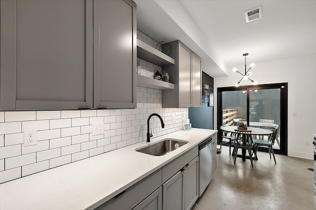 kitchen featuring gray cabinetry, a sink, visible vents, stainless steel dishwasher, and open shelves