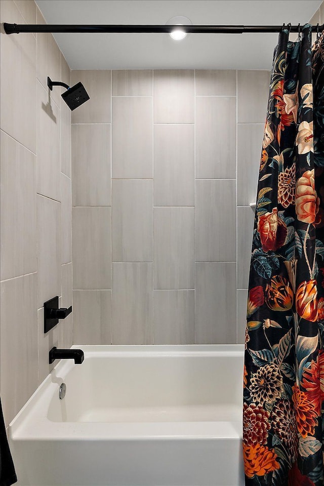 full bath featuring shower / bath combo with shower curtain