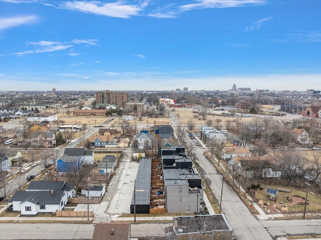 birds eye view of property featuring a view of city