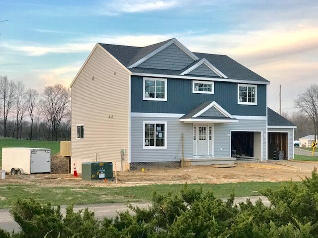 view of front of property with central AC