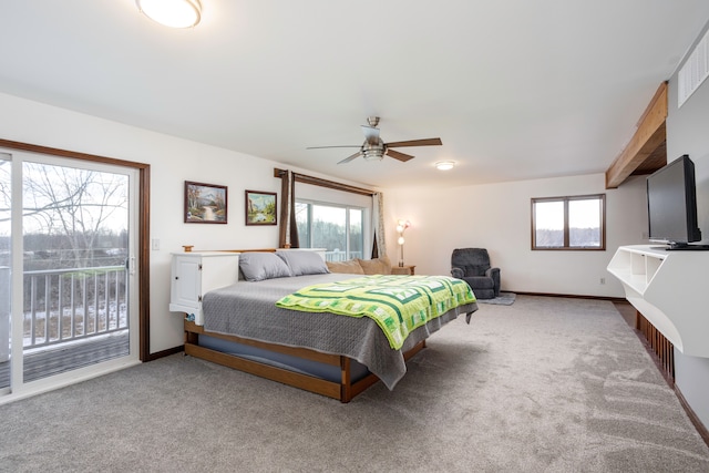 carpeted bedroom with access to exterior, multiple windows, baseboards, and a ceiling fan